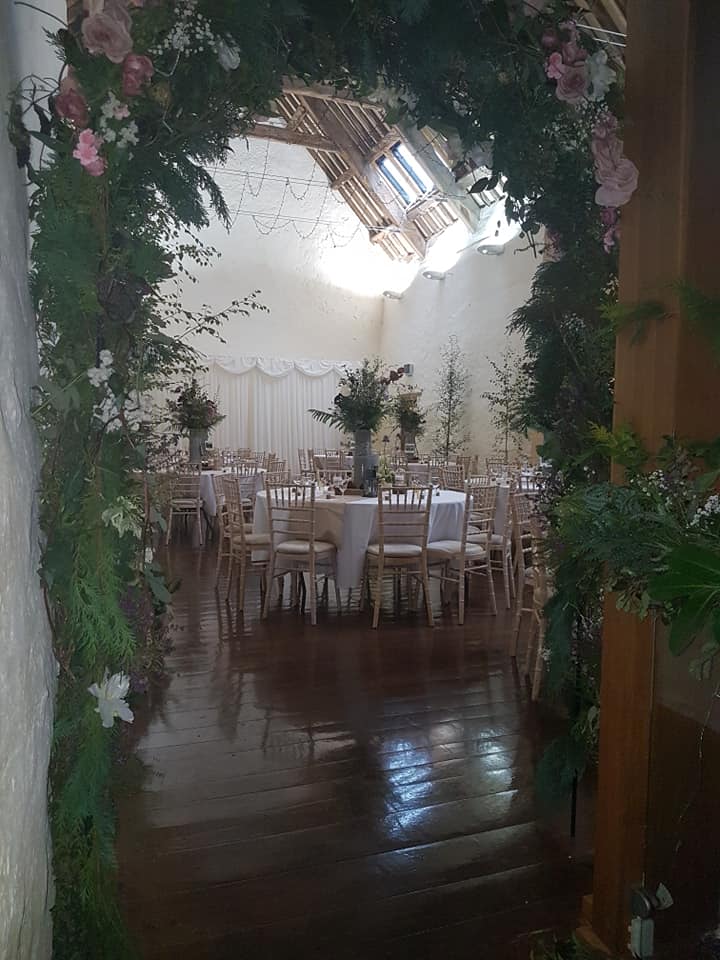 Dunster Tythe Barn decorated with Trees