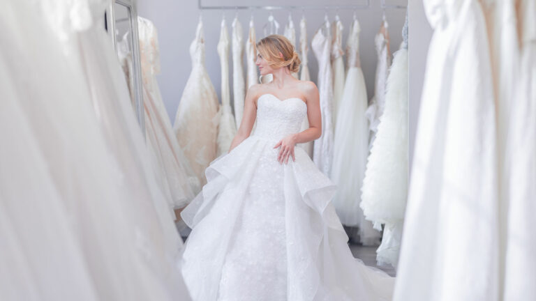 Affordable wedding dress shops in Essex bride try on 768x432