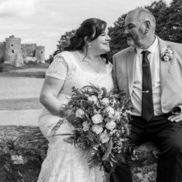 Carew Castle Wedding Venue in Pembrokeshire The Wedding Directory Carew Castle Wedding Couple with Castle in background 260x260