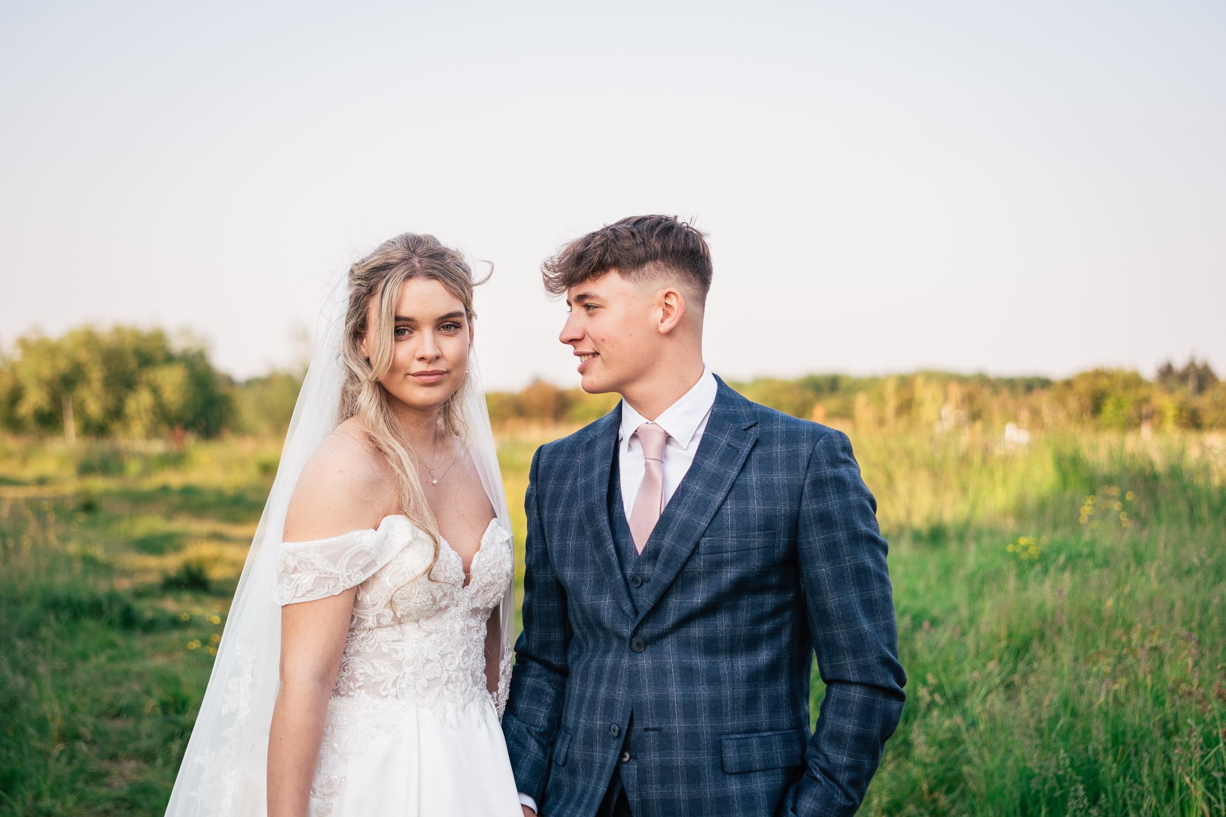 Kent Wedding Photographer bride and groom pposedd