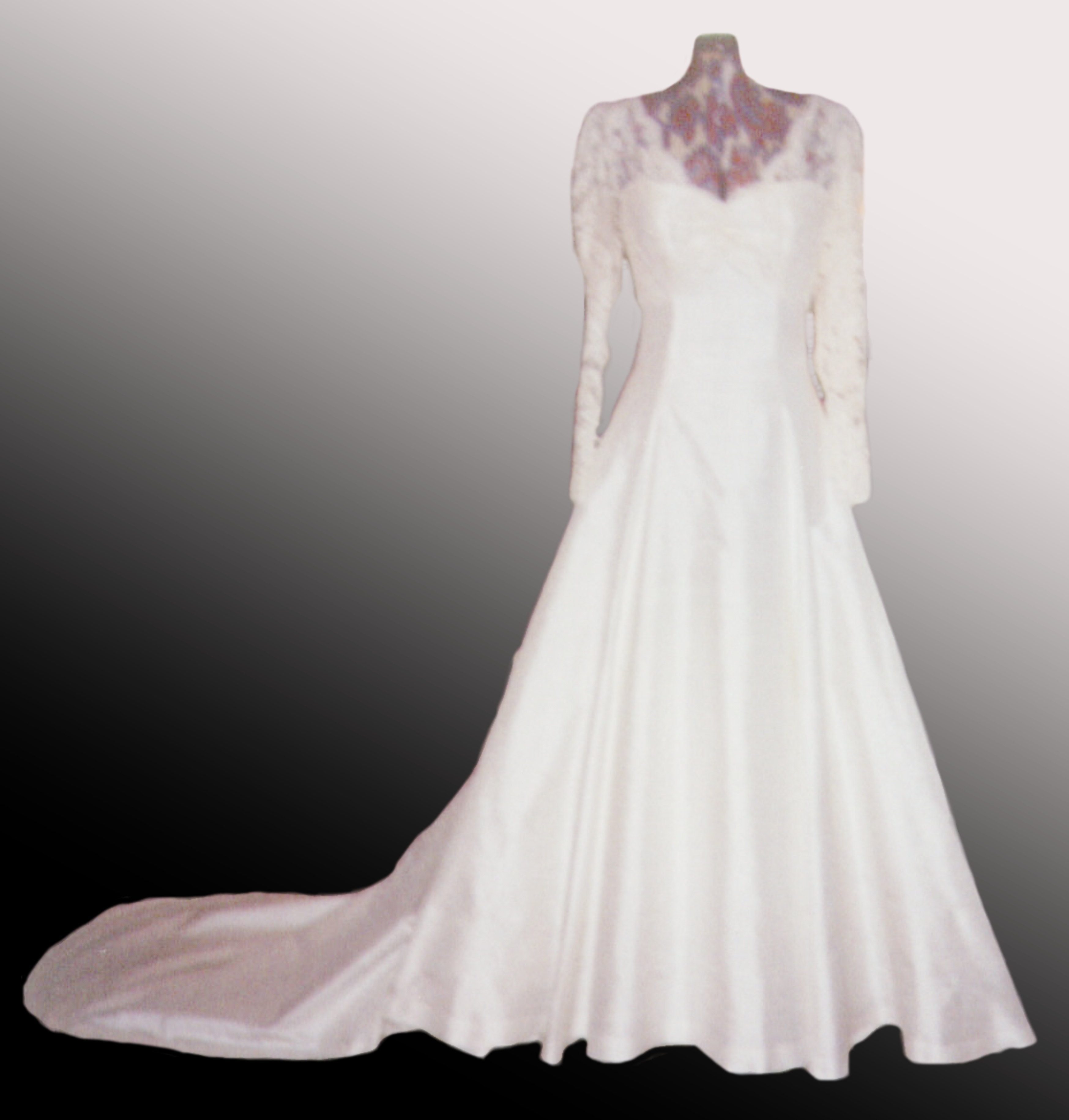 Ivory silk dupion wedding dress with lace bodice, long sleeves and a train