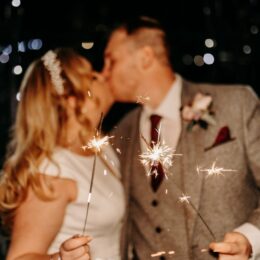 Bride and Groom with fireworks 260x260