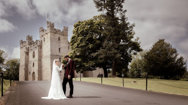 Bride and Groom outside Langley Castle Hotel