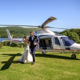Chris Laura with helicopter Medium 260x260