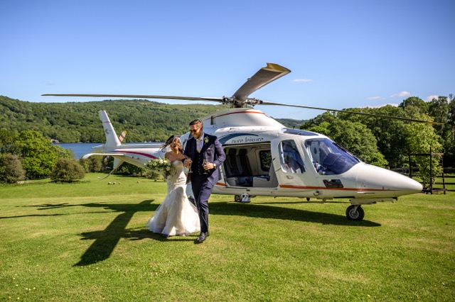 Chris Laura with helicopter Medium